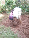 Preparing the mud for the hut