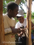 Keron and Ivory working on the hut