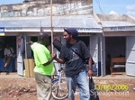 Chris receiving a warm greeting from a local