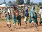 Familiar sight of school children dancing and singing