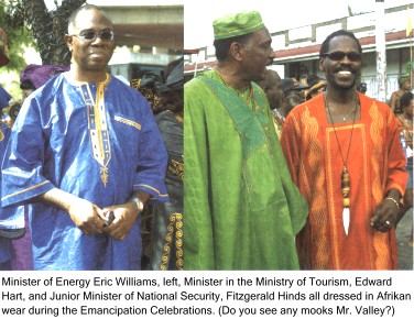 Minister of Energy Eric Williams, left, Minister of Tourism, Edward Hart, and Junior Minister of National Security, Fitzgerald Hinds all dressed in Afrikan wear during the Emancipation Celebrations.